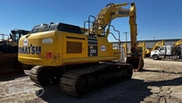 Back of used Excavator in yard for sale